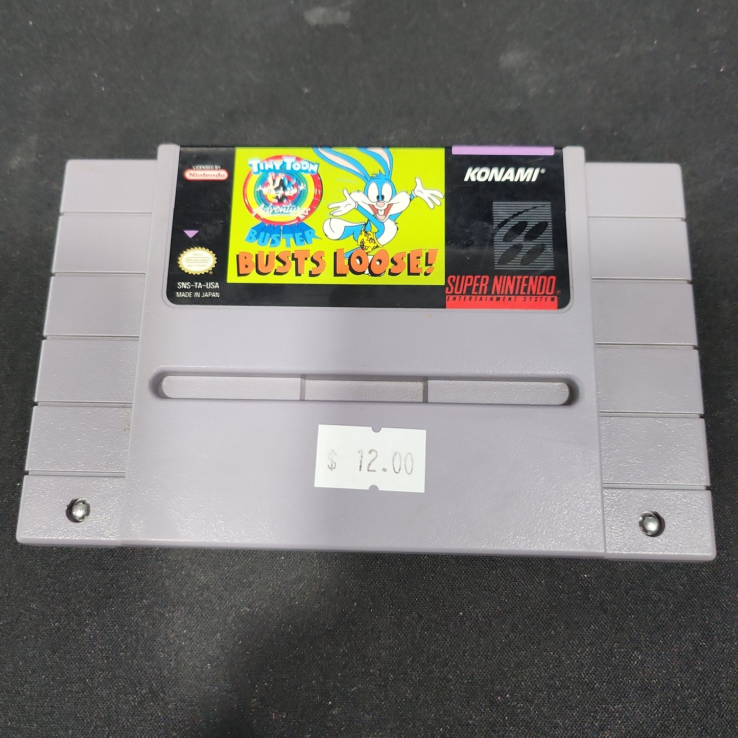 Tiny town buster busts loose snes